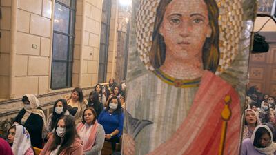 Worshippers attend Midnight Mass at the Church of St George. Christmas Mass begins around 8pm and ends at midnight, when worshippers go home to break a 43-day meat-free fast with traditional dishes. AP Photo