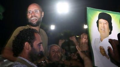 Pictures of Saif Al Islam Qaddafi, celebrating in Tripoli yesterday have hurt the rebels' credibility. AP Photo