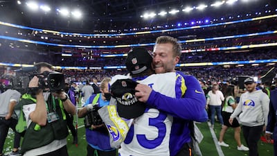 Los Angeles Rams' Nick Scott and head coach Sean McVay celebrate. Reuters