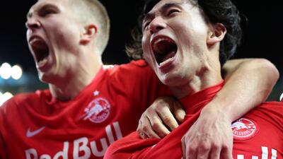 Takumi Minamino, right, will officially join Liverpool on January 1. AP