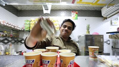 Mohammed Ali prepares karak tea in Ras Al Khaimah. Chris Whiteoak / The National