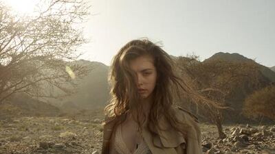 The sun also rises: Dress, Dh62,000; trench coat, Dh13,500; shoes, Dh2,900, all from Christian Dior. Rose gold necklace, Dh9,750; black and gold necklace, Dh17,500, both from Akillis at Ahmed Seddiqi & Sons. Photography by Mann at Things by People; Fashion director Sarah Maisey; Stylist Hafsa Lodi; Make-up Sharon Drugan at Things by People; Hair Jehnna Mahoney at Things by People; Model Iullia at Wilhemina Dubai; Photographer’s assistant Macky.