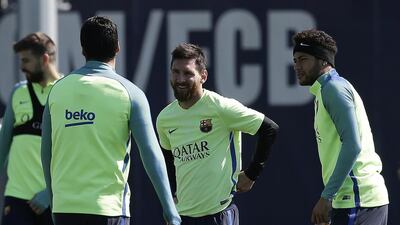 Left to right: Luis Suarez, Lionel Messi and Neymar. Manu Fernandez / AP Photo
