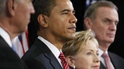 President-elect Barack Obama, second from the left, stands with, from left to right, Vice President-elect Joe Biden, Secretary of State-designate Sen. Hillary Rodham Clinton, and National Security Advisor-designate Ret Marine Gen. James Jones, at a news conference to announce his national security team, in Chicago.