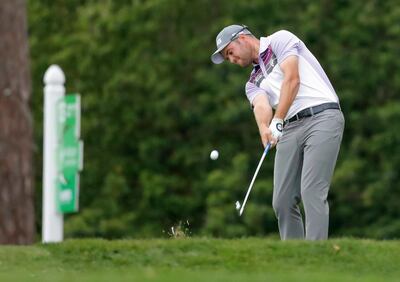 Corey Conners carded a 68 for 204 to maintain the lead he has held since the first round. Mike Carlson / AP Photo