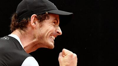 Andy Murray of Great Britain celebrates against Serbian Novak Djokovic during the final match of the ATP Tennis Open tournament game at the Foro Italico in Rome. Tiziana Fabi / AFP