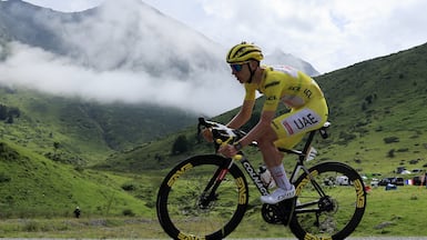 Yellow jersey Slovenian rider Tadej Pogacar of UAE Team Emirates in action during the 14th stage of the 2024 Tour de France cycling race over 151km from Pau to Saint-Lary-Soulan Pla d'Adet, France, 13 July 2024. EPA / GUILLAUME HORCAJUELO