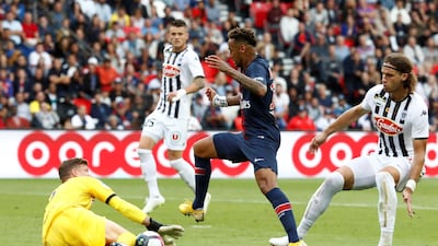 Neymar in action with Angers' Ludovic Butelle. Reuters