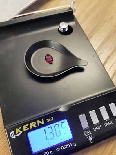 Weighing a stone is part of the identification and valuation process. Sarah Maisey / The National