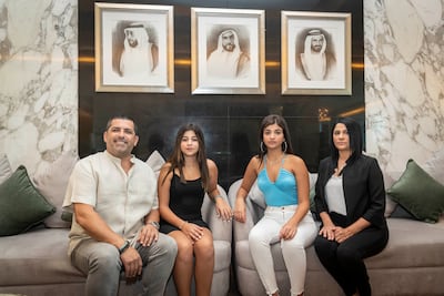 Mr Zamir with his daughters Hila and Shira and wife Hagit Zamir in the lobby of his Dubai apartment. He describes the emirate as the safest place in the world. Antonie Robertson / The National