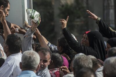 Egyptians rushed to buy sugar from a truck in Cairo during a previous shortage in 2016. AFP