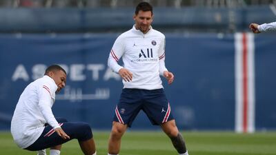Mbappe and Lionel Messi. AFP