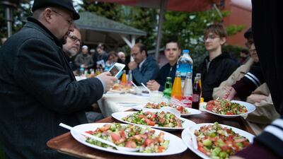 People from the House of One gather for iftar in Berlin, Germany. EPA
