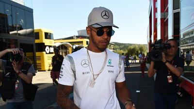 Mercedes-GP driver Lewis Hamilton arrives for a press conference ahead of the Formula One Grand Prix of Belgium at the Spa-Francorchamps circuit on August 25, 2016. John Thys / AFP