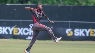 Karthik Meiyappan celebrates a wicket in UAE's five-wicket win over Scotland in the Cricket World Cup League 2 in Texas. All photos courtesy USA Cricket