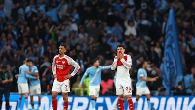 Arsenal's Martin Zubimendi and William Saliba after Manchester City scored the second goal. Reuters