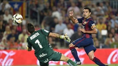 The ageing Xavi Hernandez, right, will get to play more football if he leaves Barcelona for, say, Qatar’s Al Sadd. Lluis Gene / AFP