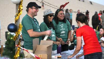 Abu Dhabi, United Arab Emirates - Volunteers of St. Andrews Church are ever ready to help for the event. Khushnum Bhandari for The National