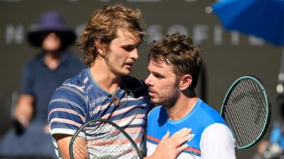 Alexander Zverev, left, and Stan Wawrinka greet each other at the net after their Australian Open qiarter-final. AP Photo