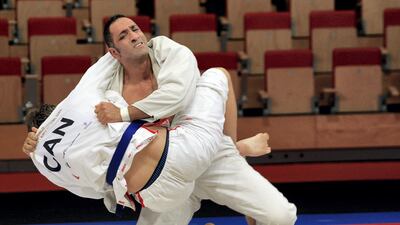 Canada's Andrew Buckley, left, and Habib Ranjbar of Iran during the JJIF World Championship in Abu Dhabi. Satish Kumar for The National