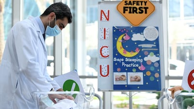 Dr Anas Alshorman, paediatrician from Sheikh Shakhbout Medical City in Abu Dhabi, talks observers through child trauma treatment. All photos by Khushnum Bhandari / The National