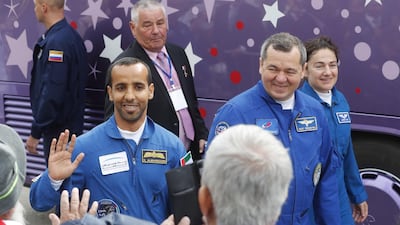 Hazza Al Mansouri, Oleg Skripochka and Jessica Meir leave a hotel and board a bus to the launch pad. They are scheduled to blast off for ISS at 5.56pm UAE time. EPA