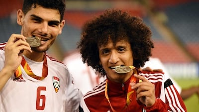 Omar Abdulrahman, right, and Mohaned Salem, left, pose with their bronze medals from the 2015 Asian Cup in Australia. Dean Lewins / EPA / January 30, 2015