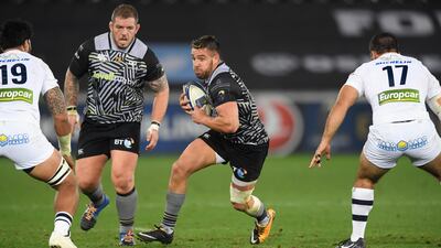 Ospreys scrum-half Rhys Webb makes a break during the European Rugby Champions Cup match against Clermont Auvergne at Liberty Stadium. Stu Forster / Getty Images