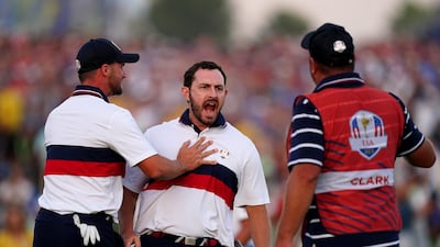 Patrick Cantlay of Team USA celebrates his putt on the 18th during the fourballs on day two of the Ryder Cup at the Marco Simone Golf and Country Club in Rome. PA