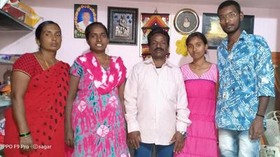 Durgaiah Dobbali is reunited with his wife and children after 15 years. Authorities in the UAE helped him return home last week. The Dobbali family