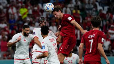Denmark's Joachim Andersen heads the ball during the match. AP