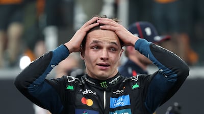 McLaren driver Lando Norris celebrates becoming Formula One world champion at the Yas Marina Circuit in Abu Dhabi. Chris Whiteoak / The National