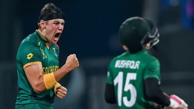 South Africa's Gerald Coetzee celebrates after taking the wicket of Bangladesh's Mushfiqur Rahim in their Cricket World Cup match at Wankhede Stadium, Mumbai, on October 24, 2023. AFP