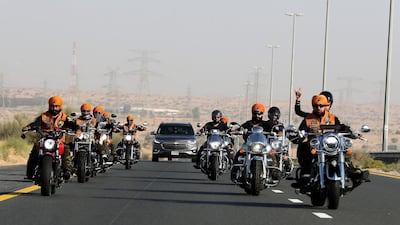The club heads out with a convoy of support vehicles. Pawan Singh / The National