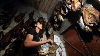 A man prepares traditional masmouta, to be sold at a market in Basra. Reuters