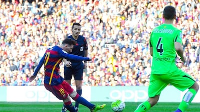 Lionel Messi of FC Barcelona scores his team’s fourth goal during the La Liga match between FC Barcelona and Getafe CF at Camp Nou on March 12, 2016 in Barcelona, Spain. (Photo by David Ramos/Getty Images)