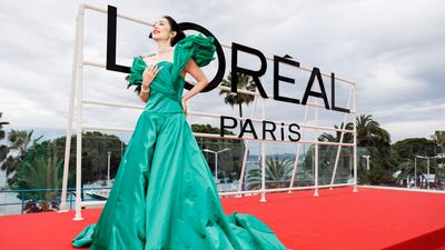 Gao Ye in emerald taffeta. Getty Images
