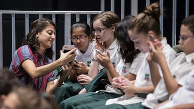 Victoria Nassif helps students from Al Raha School during a rehearsal Nikith Nath / NYUAD