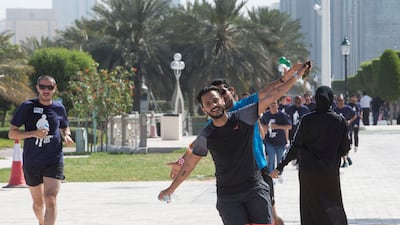 Runners celebrate after finishing the race.