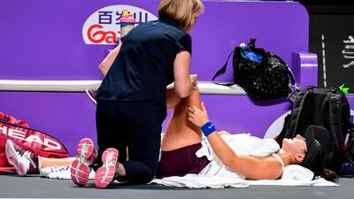 Bianca Andreescu receives treatment during her match against Karolina Pliskova. AFP
