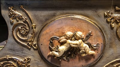 Angelic details on the grand Steinway piano.