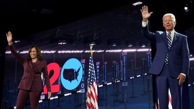 Democratic presidential candidate and former Vice President Joe Biden waves next to U.S. Senator Kamala Harris (D-CA) after she accepted the Democratic vice presidential nomination during an acceptance speech delivered for the largely virtual 2020 Democratic National Convention from the Chase Center in Wilmington, Delaware, U.S. REUTERS