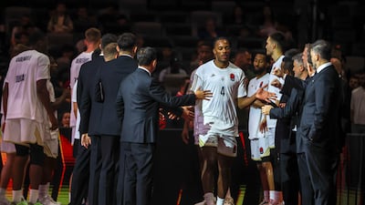 Jaron Blossomgame of Dubai Basketball walks onto the court at Etihad Arena, Abu Dhabi, for the EuroLeague SuperCup semi-final against Real Madrid. All photos: Victor Besa / The National