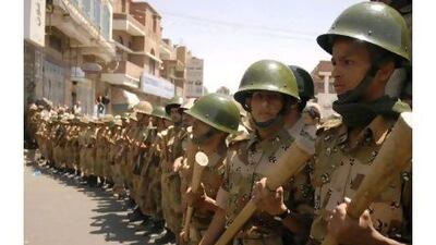 Ali Abdullah Saleh's return to Yemen has sparked fresh protests, which the army prepared to face in Sanaa yesterday. Mohamed Al Sayaghi / Reuters