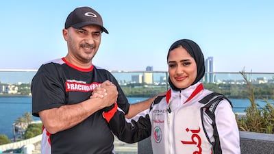 Alia Abdulsalam, the first Emirati female powerboat driver, with her father Abdulsalam Fairooz. Victor Besa / The National