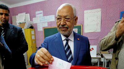 Rached Ghannouchi, head of the moderate Islamist Ennahda party, casts his vote at a polling station for the municipal election in Tunis, Tunisia, May 6, 2018. Reuters
