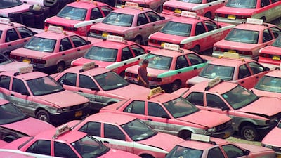 Past imperfect. This 1997 photo shows a taxi driver walking through hundreds of taxis taken out of service to save operating costs in Bangkok, Thailand. Asia's recovery from its crisis has lessons for other countries today. Sakchai Lalit : AP