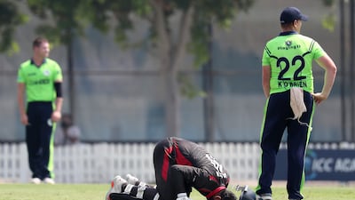 Mohammad Waseem of UAE prays after scoring his century against Ireland.