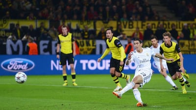 Angel Di Maria of Real Madrid takes his penalty, which was saved by Roman Weidenfeller of Borussia Dortmund during Tuesday night’s Champions League quarter-final. Lars Baron / Bongarts / Getty Images / April 8, 2014