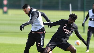 Gabriel Martinelli and Thomas Partey of Arsenal during training on Wednesday. Getty
